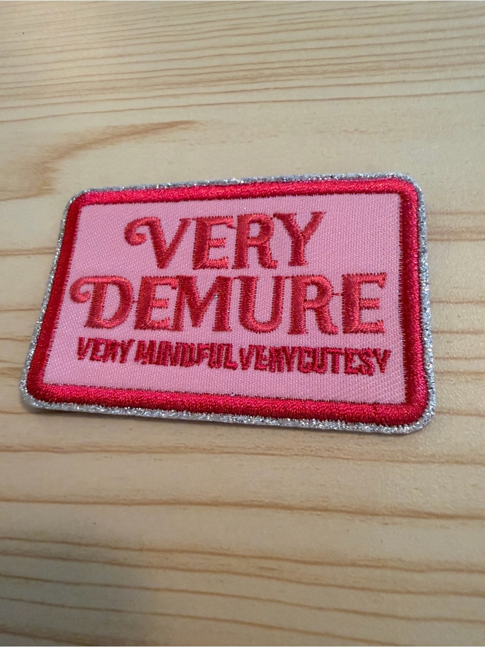 Very Demure Pink Embroidered Patch with Silver Trim